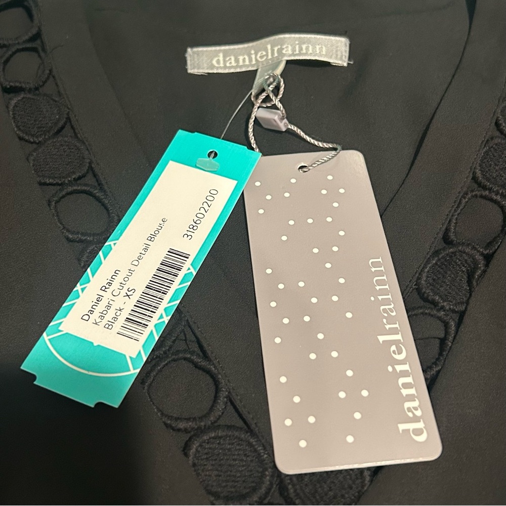 Donated - not for sale.
Cutout Detail Blouse in black - Picture 4 of 4
